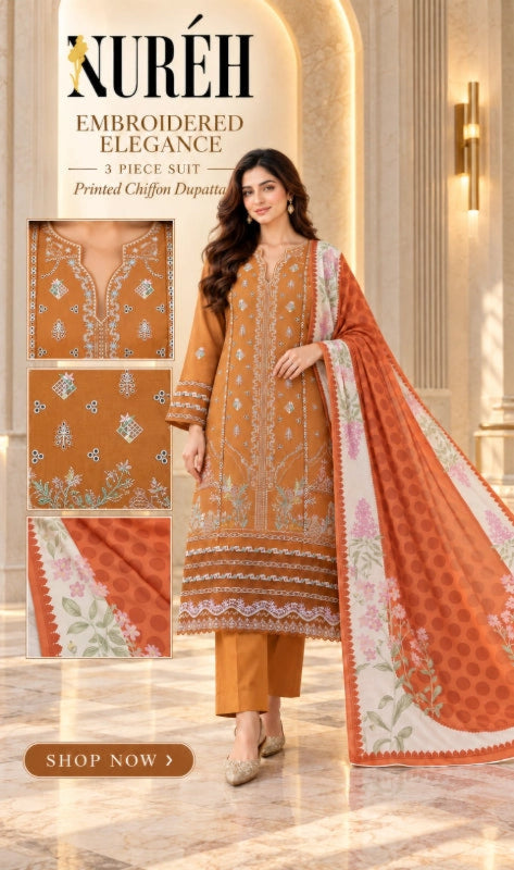 A woman models a three-piece embroidered suit from Nuréh Embroidered Elegance. The outfit consists of a burnt orange kurta with intricate white and gold embroidery, matching orange trousers, and a coordinating orange dupatta with floral patterns.