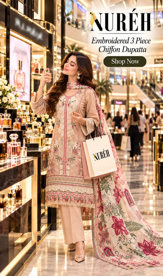Model wearing Nureh Karandi Embroidered Suite Design 6, pink embroidered 3-piece suit with printed chiffon dupatta
